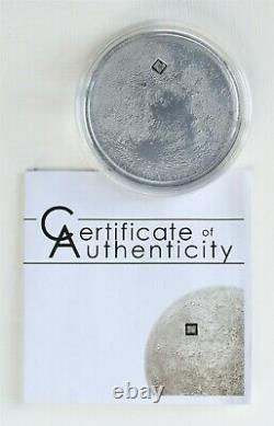 2009 Cook Islands $5 Silver Moon Coin with piece of NWA 4881 Lunar Meteorite