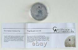 2009 Cook Islands $5 Silver Moon Coin with piece of NWA 4881 Lunar Meteorite