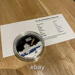2011 Cook Islands $5 The Mounionalusta Meteorite silver coin with real meteorite