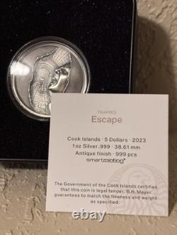 2023 Cook Islands $5 TRAPPED ESCAPE 1oz. 999 Silver Coin in OGP With COA 2023 Cook Islands $5 TRAPPED ESCAPE 1oz. 999 Silver Coin in OGP With COA
